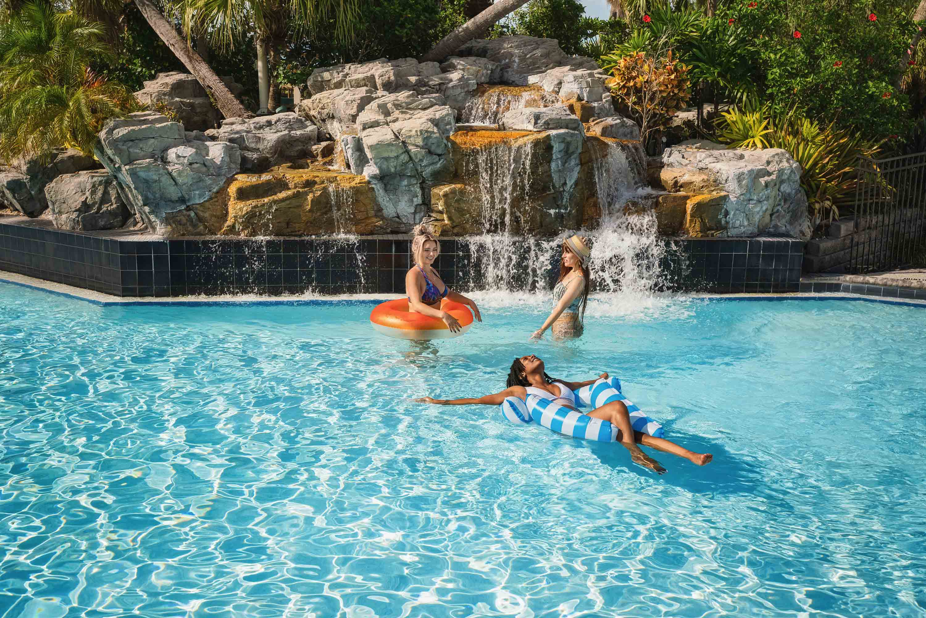 three women in the pool